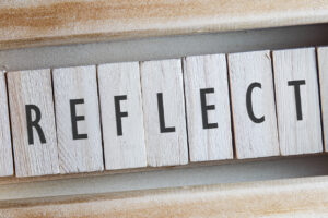 Reflect Spelled with Wooden Blocks