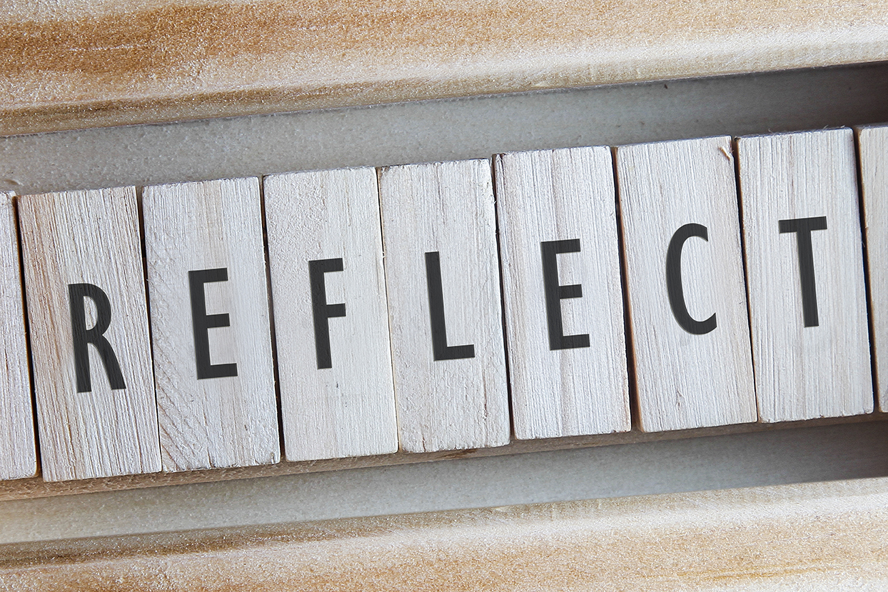 Reflect Spelled with Wooden Blocks
